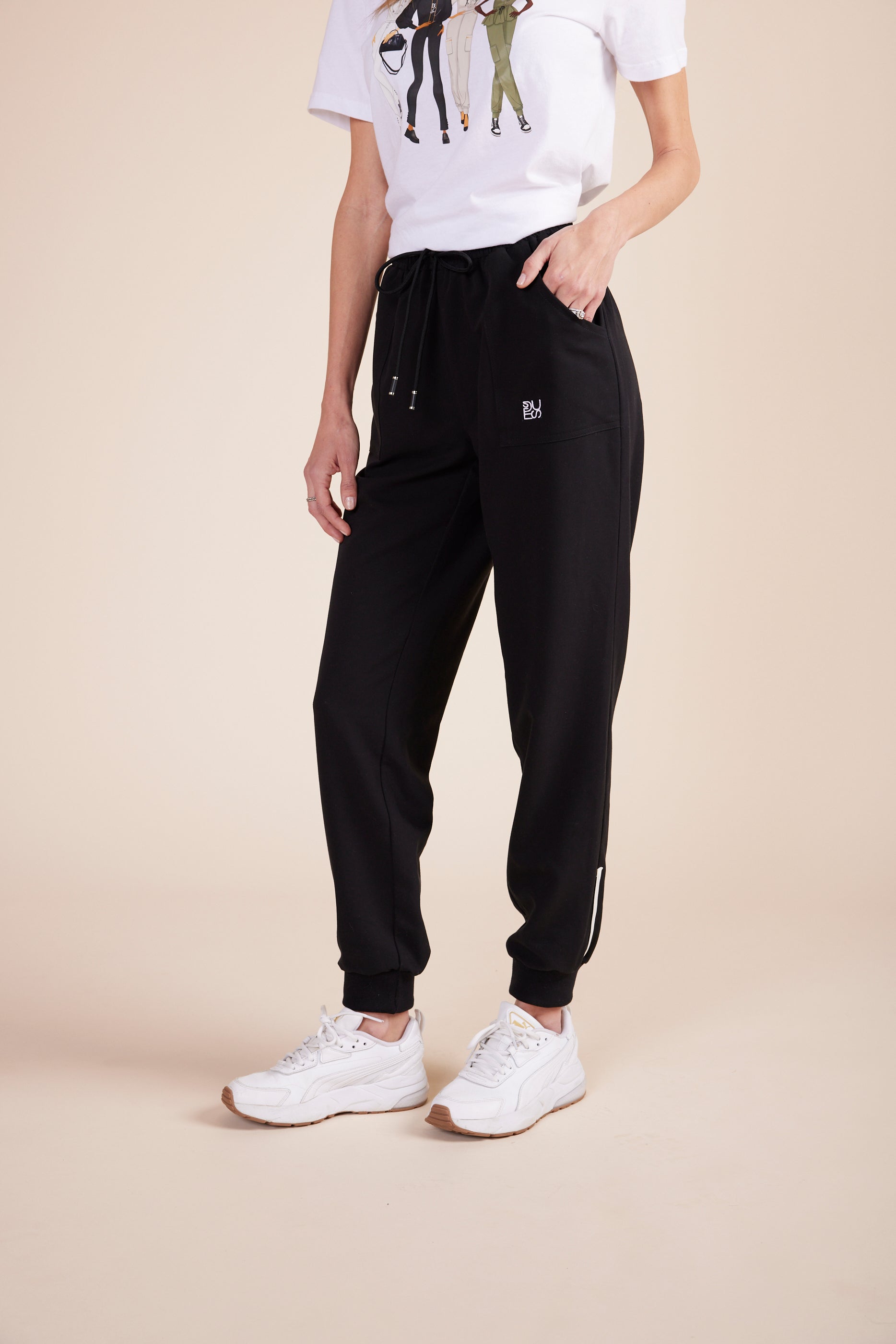 Mache Joggers in Black by DUES – luxury scrub joggers sewn in the USA, featuring a tailored athletic fit, high-stretch fabric, and functional pockets for style and performance.