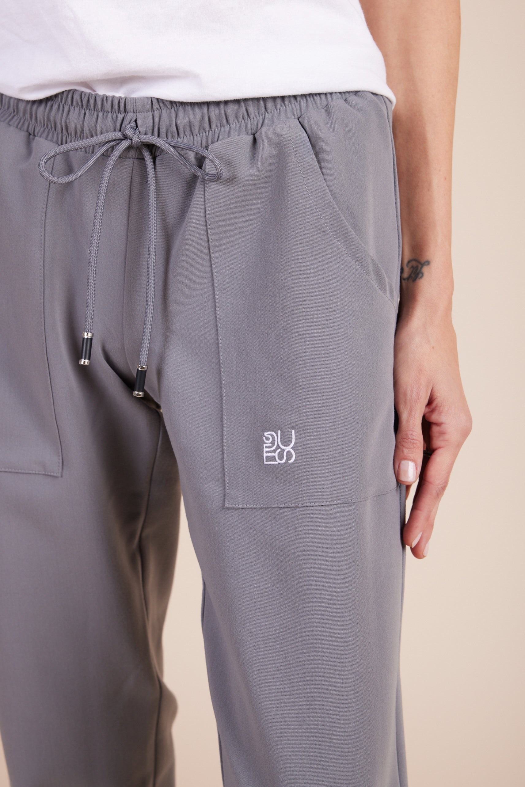 Mache Joggers in Gray by DUES – luxury scrub joggers sewn in the USA, combining modern streetwear style with medical-grade functionality and comfort.