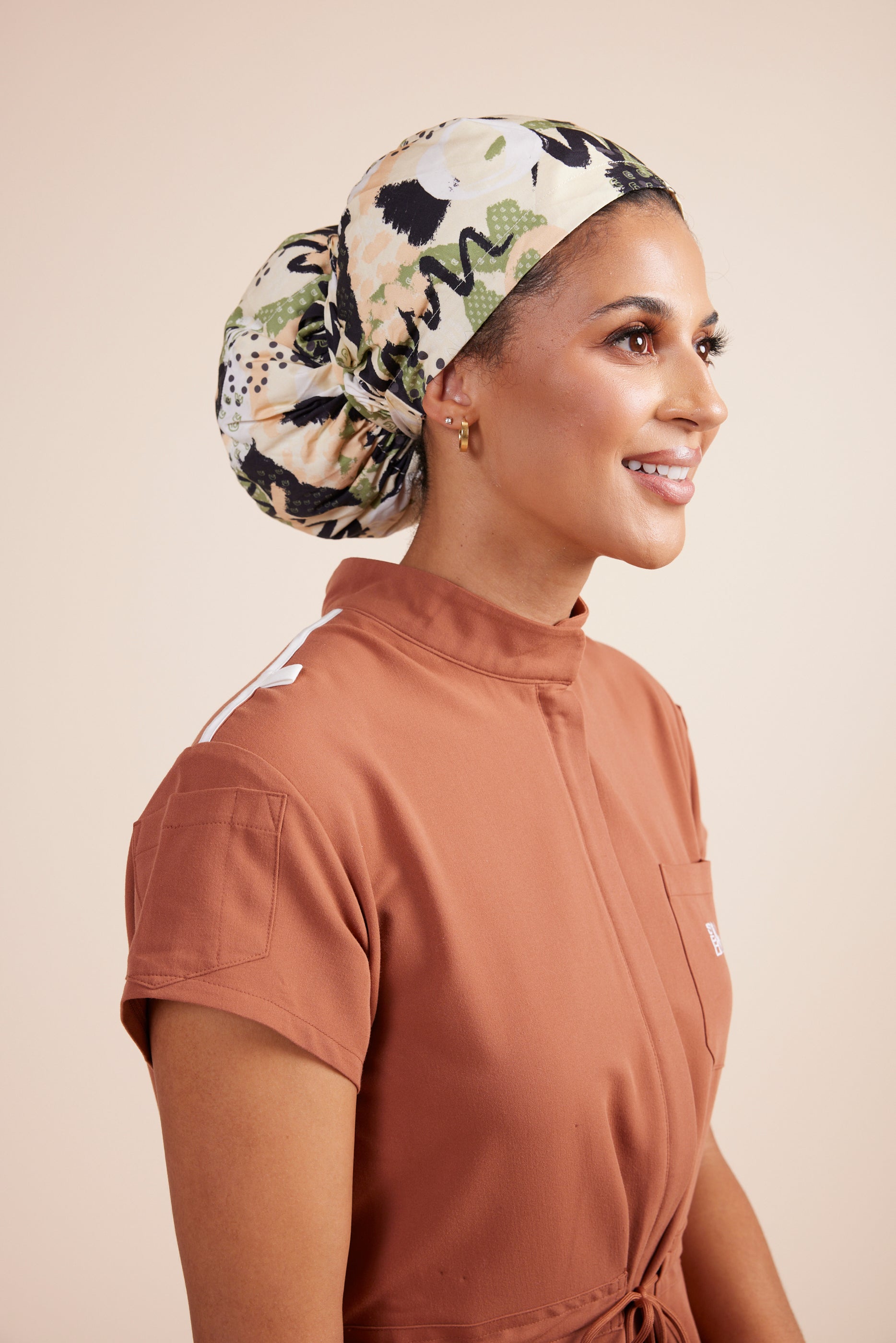 Bliss Headwrap by DUES – luxury protective headwrap sewn in the USA, made with premium stretch fabric that shields hair from friction, maintains styles, and delivers all-day comfort with effortless style.
