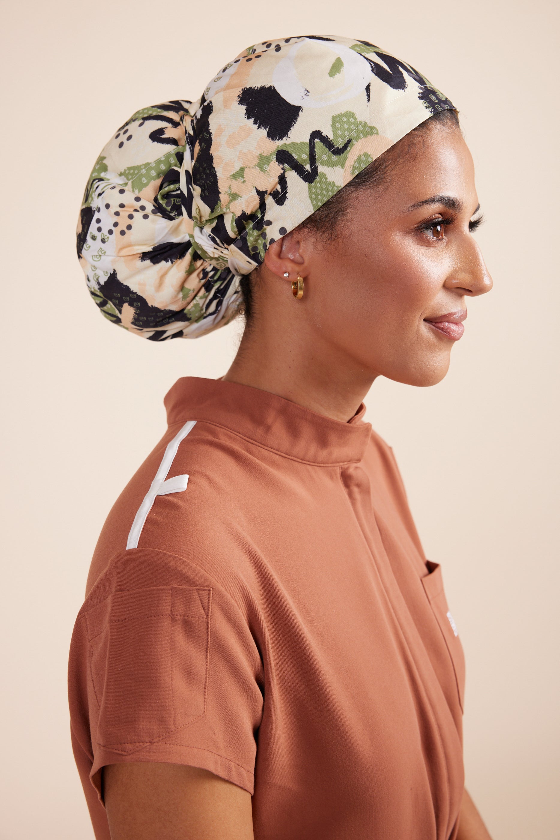 Bliss Headwrap by DUES – luxury protective headwrap sewn in the USA, made with premium stretch fabric that shields hair from friction, maintains styles, and delivers all-day comfort with effortless style.